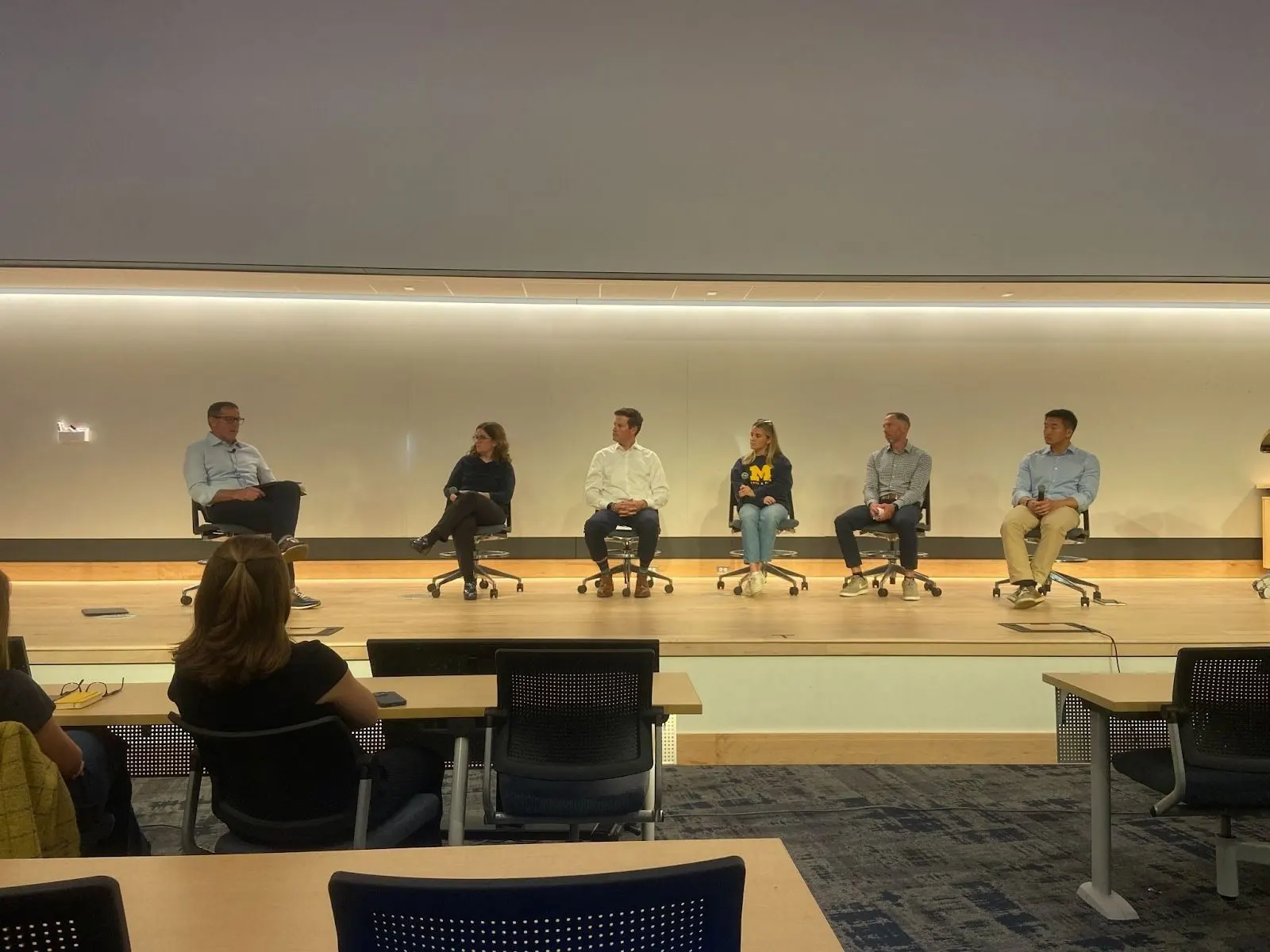 oderator Brian Griese and panelists Dr. Sara Soderstrom, Dr. Brian McCullough, Natalie DeSarbo, Paul Dunlop, and C.Y. Cheng discuss sustainability in Ann Arbor, MI on Friday, October 3rd, 2025 (image credit to Cooper Sykes).